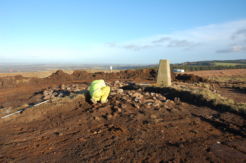 General view of cairn at the summit of Soutra Hill with Lothian Plain evident below