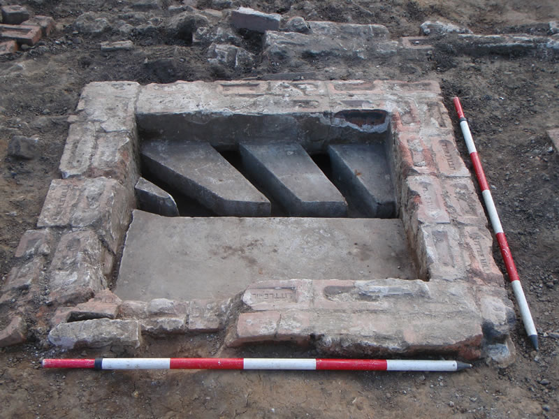 Drain junction box after removal of demolition debris